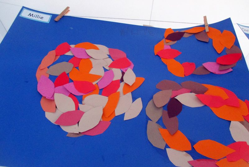 Lillie enjoyed using paper leaves to create